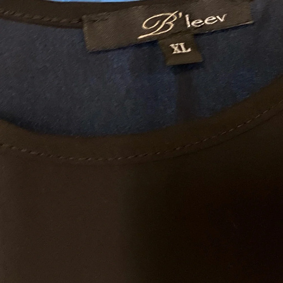 Size XL studded top, mesh like design at top - Picture 2 of 3